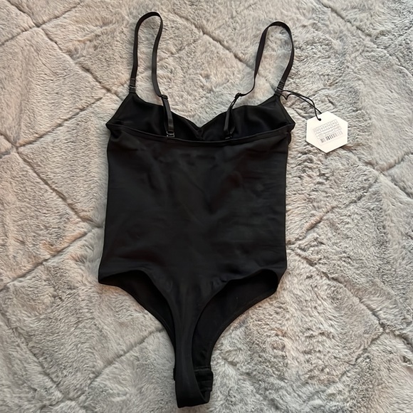 Brand new with tags, Black REVOLVE OW shapewear bodysuit. - Picture 2 of 3